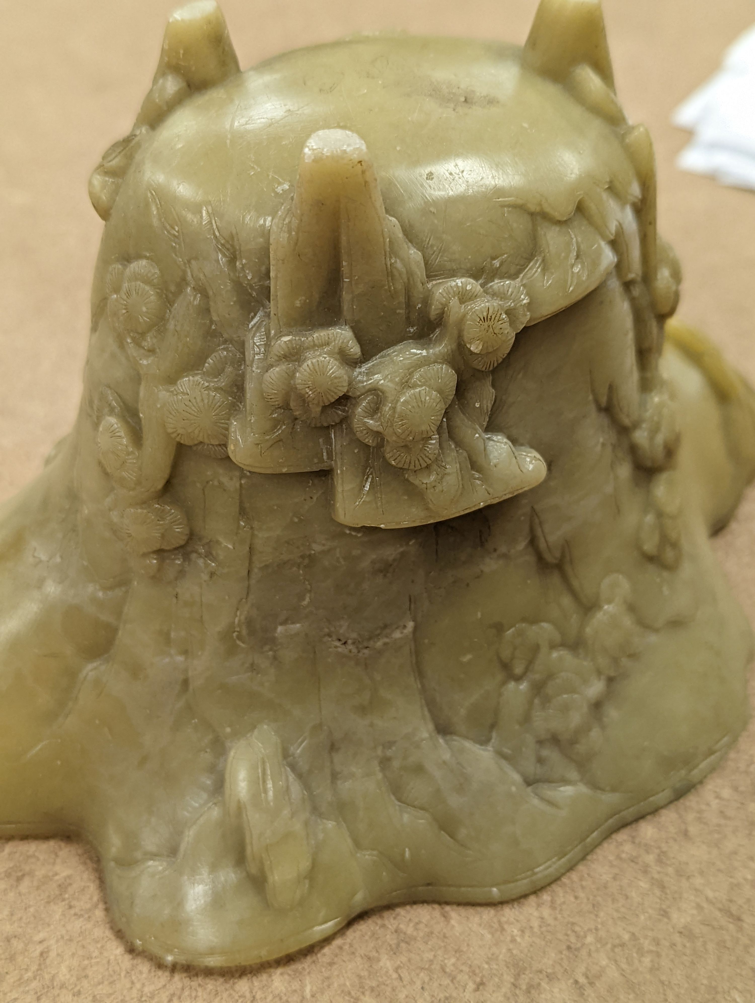 A Chinese carved soapstone libation cup, 19cm